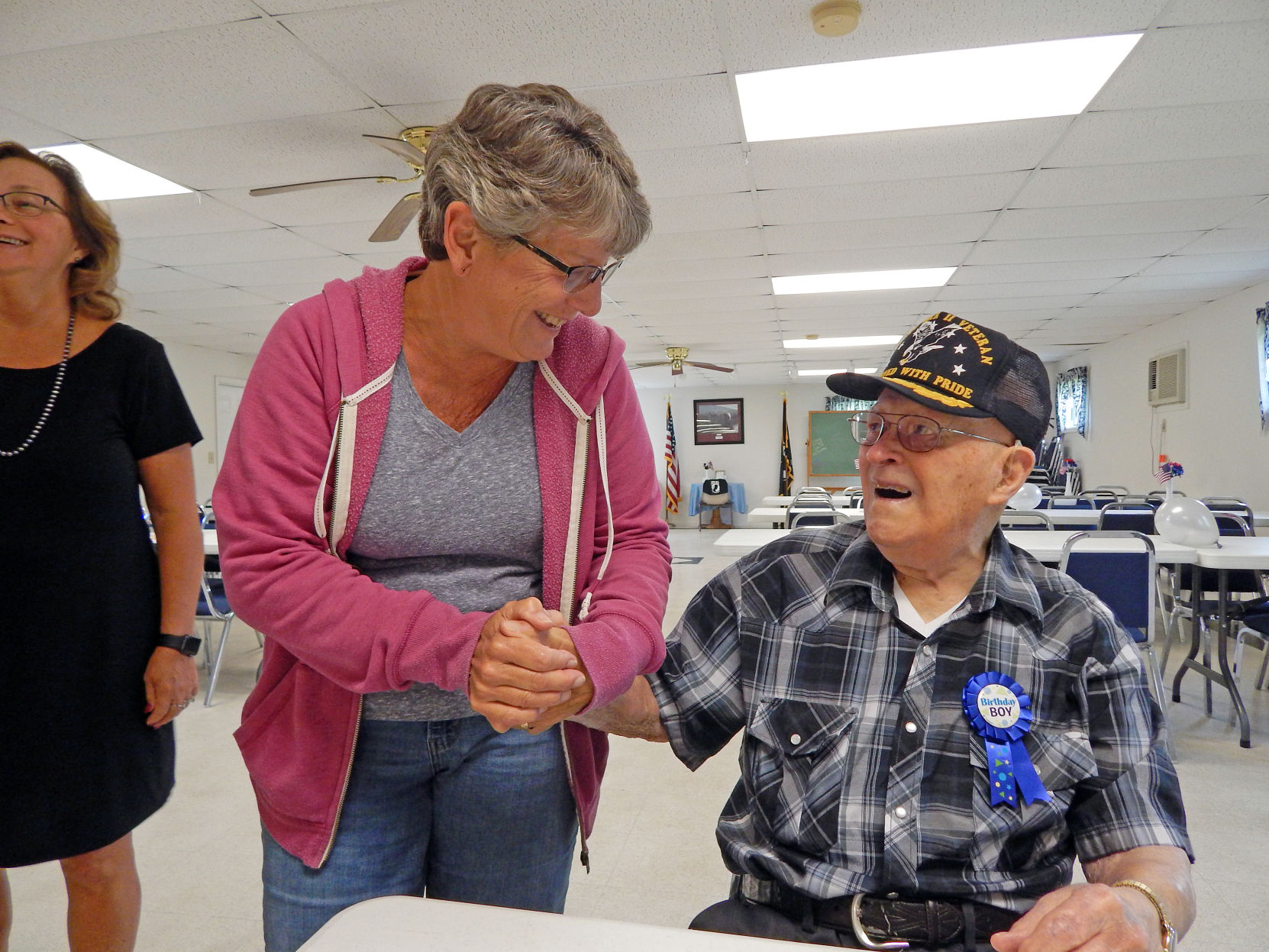Bob Stein, of Van Etten, greets Debbie Greene, of Spencer, at his 99th birthday party Aug. 24.